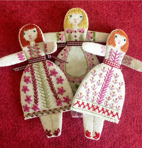 Three little folk dolls